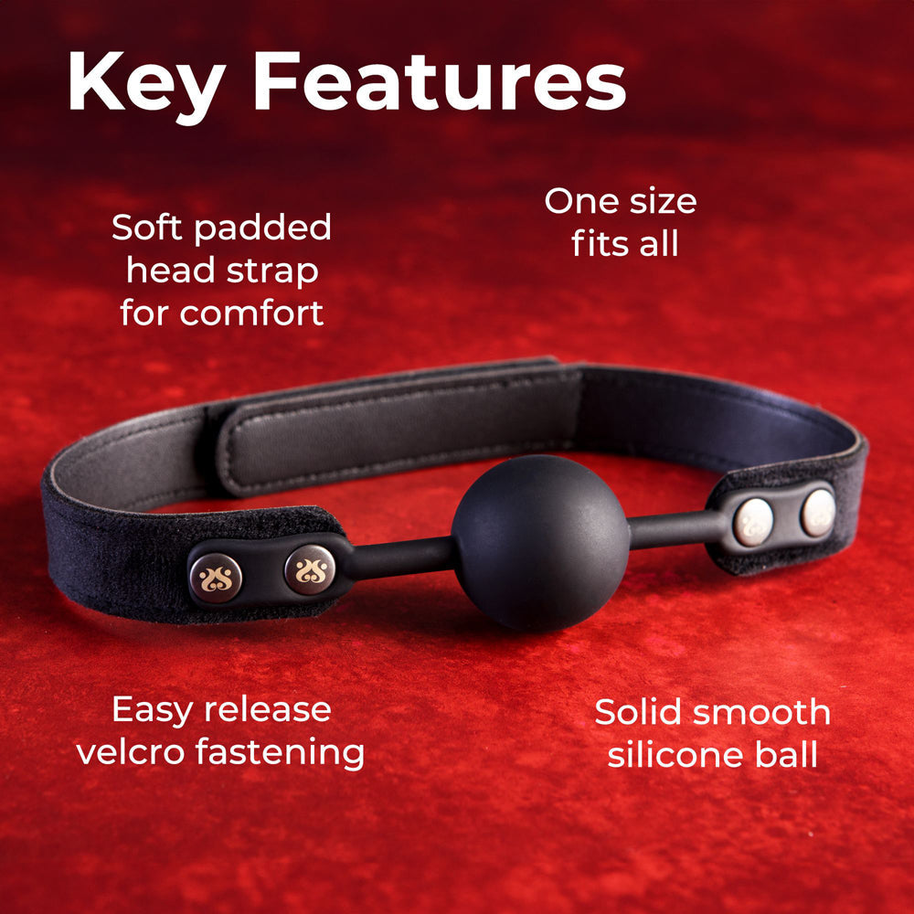 Silicone ball gag with velvet strap and velcro fastening.