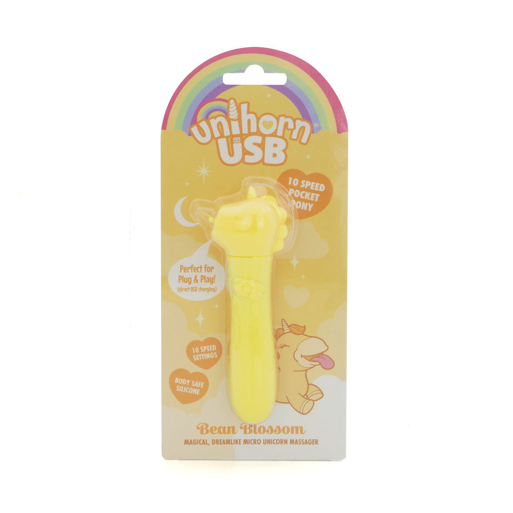 Yellow unicorn-shaped USB massager with 10 speed settings and body-safe silicone.