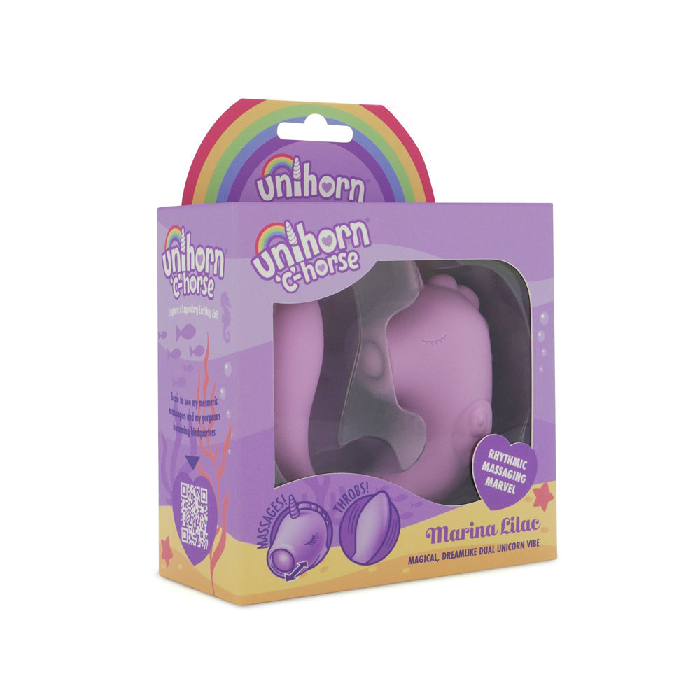 A purple Unihorn C-Horse dual motor massager in its packaging.