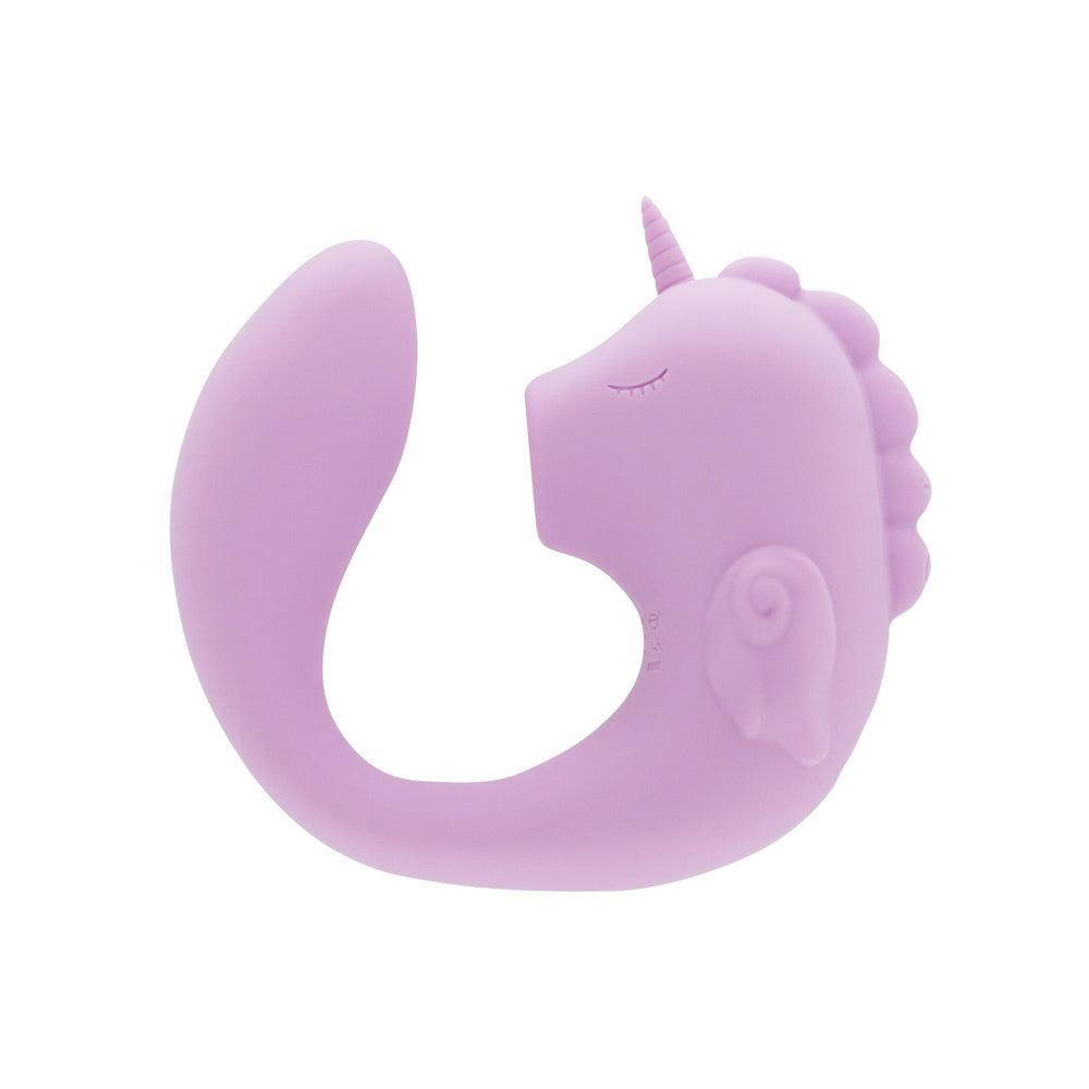 A purple unicorn-shaped silicone massager with a tail and horn.