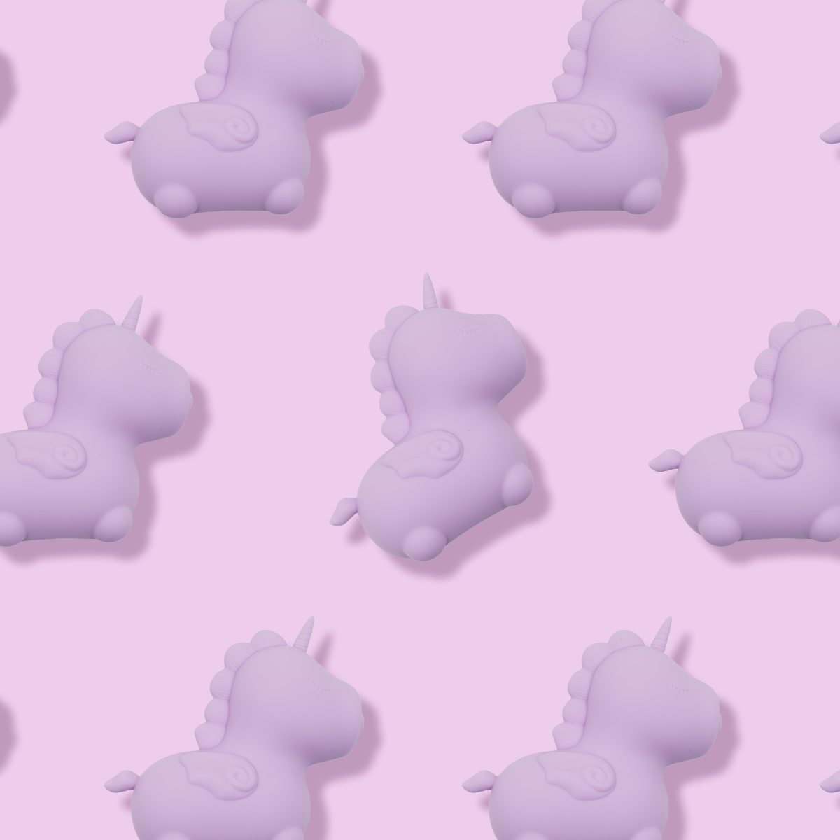Lilac unicorn-shaped silicone vibrator with wings and a mane.
