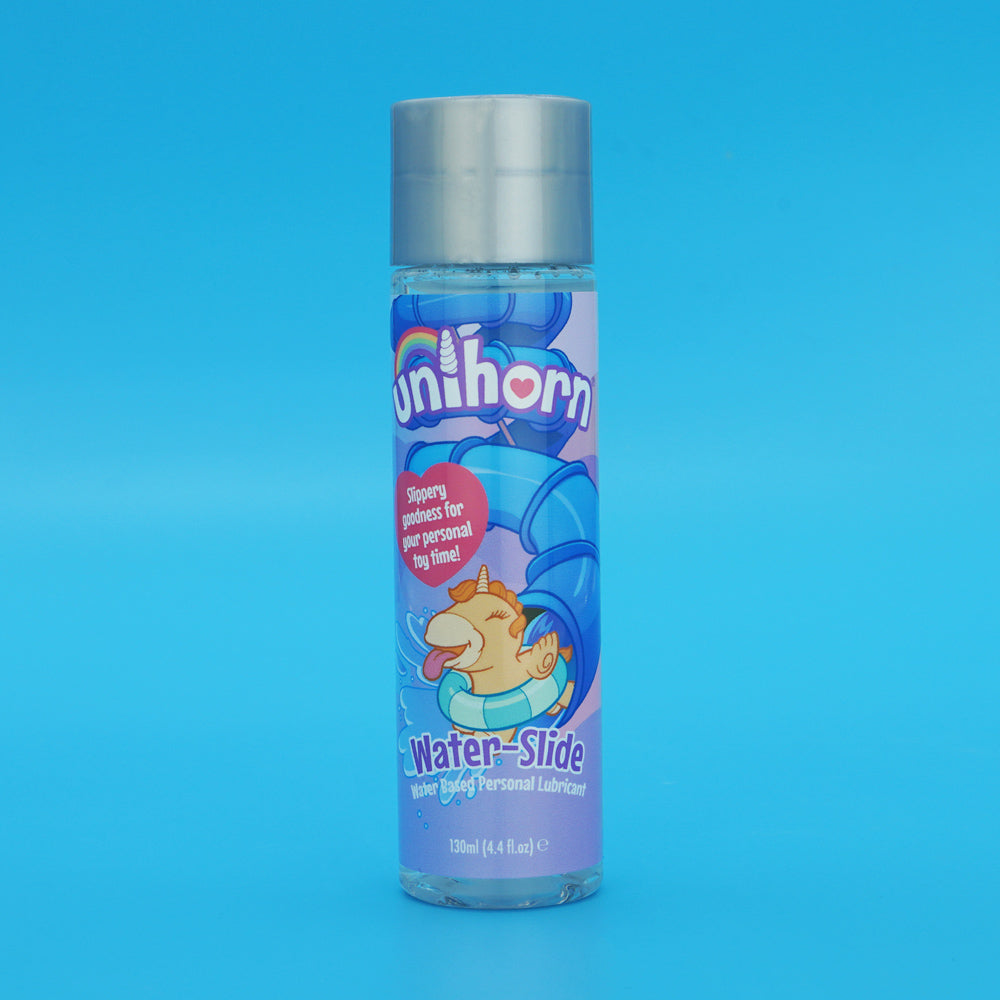 Unihorn Water-Slide water-based personal lubricant in a clear bottle with a cartoon unicorn on a water slide.