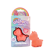 A peach colored Unihorn Mini silicone vibrator with packaging.