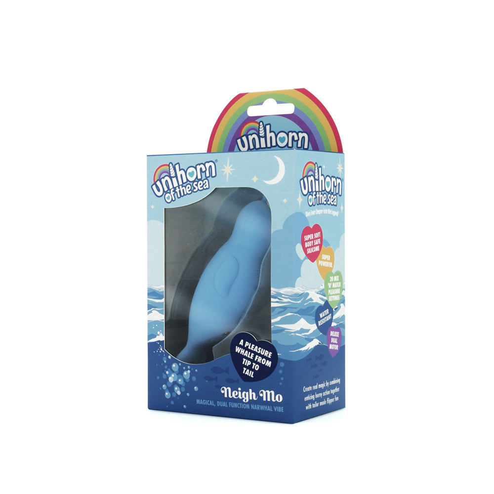 A blue narwhal-shaped silicone vibrator in its packaging.