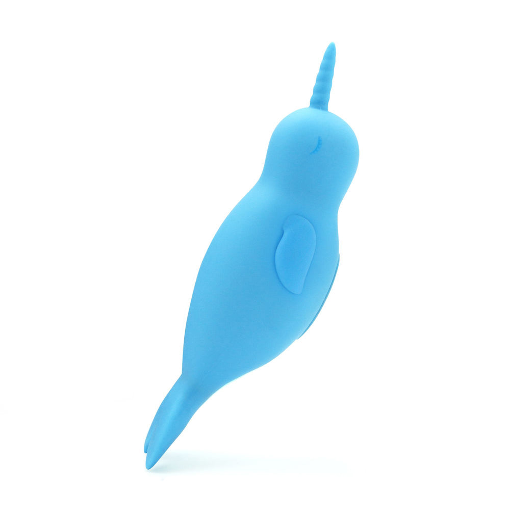 A blue silicone narwhal vibrator with a horn and tail.