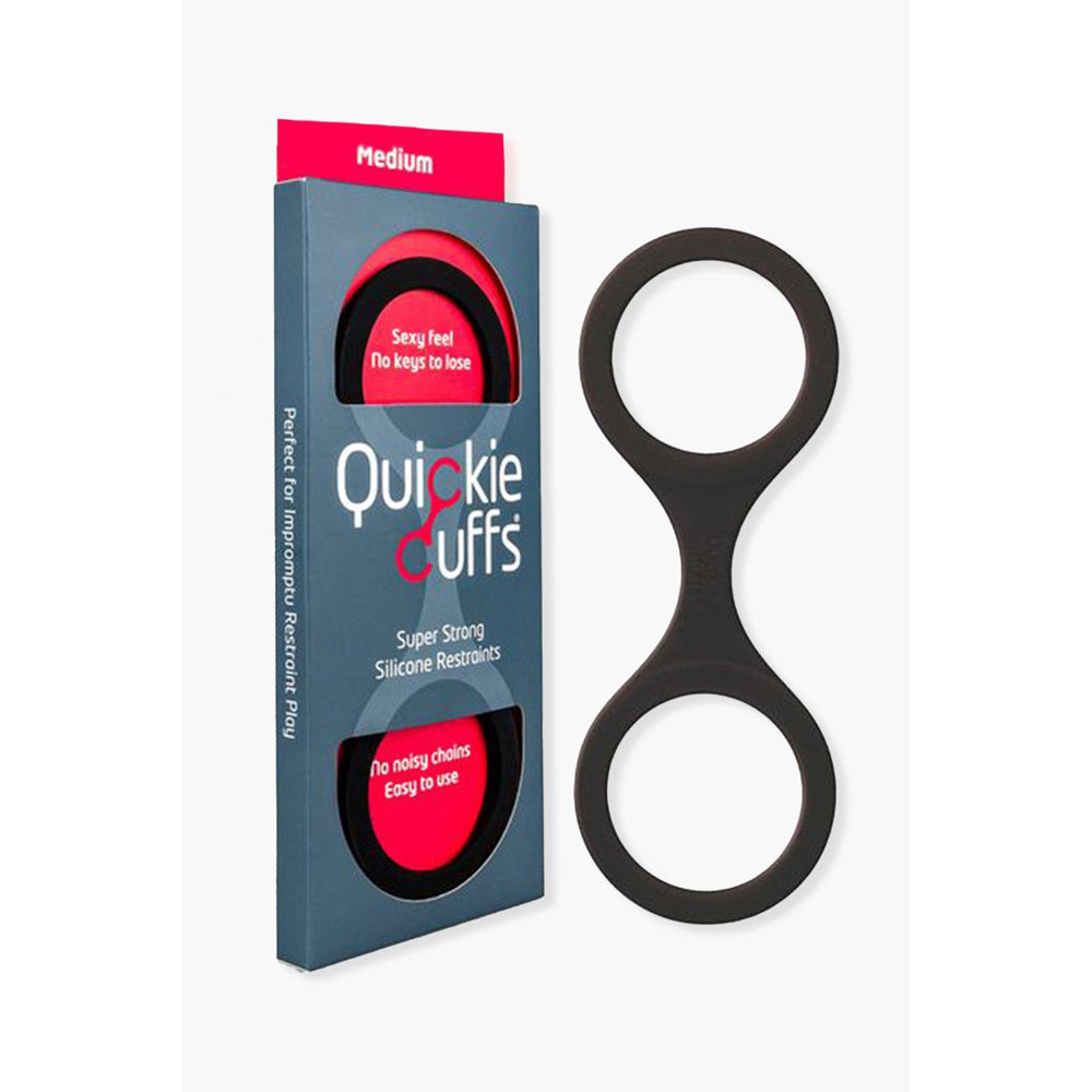 Black silicone Quickie Cuffs wrist restraints with packaging.