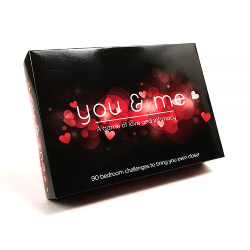 A black box for the You & Me card game with hearts and text.