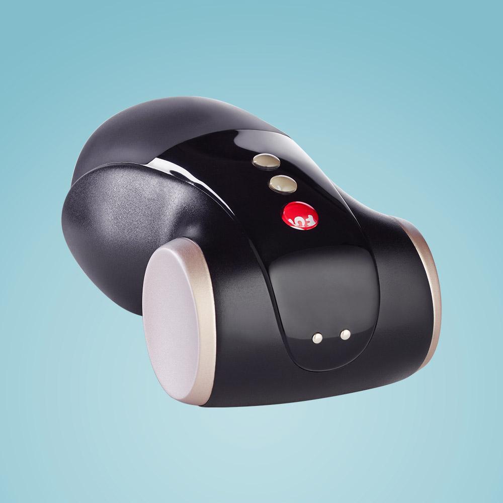 Black and gold Cobra Libre II vibrating masturbator with red button.