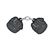Soft enamel lapel pin resembling large leather handcuffs.