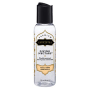 Kama Sutra Divine Nectars Vanilla Crème flavored water-based lube in a clear bottle with a black cap.