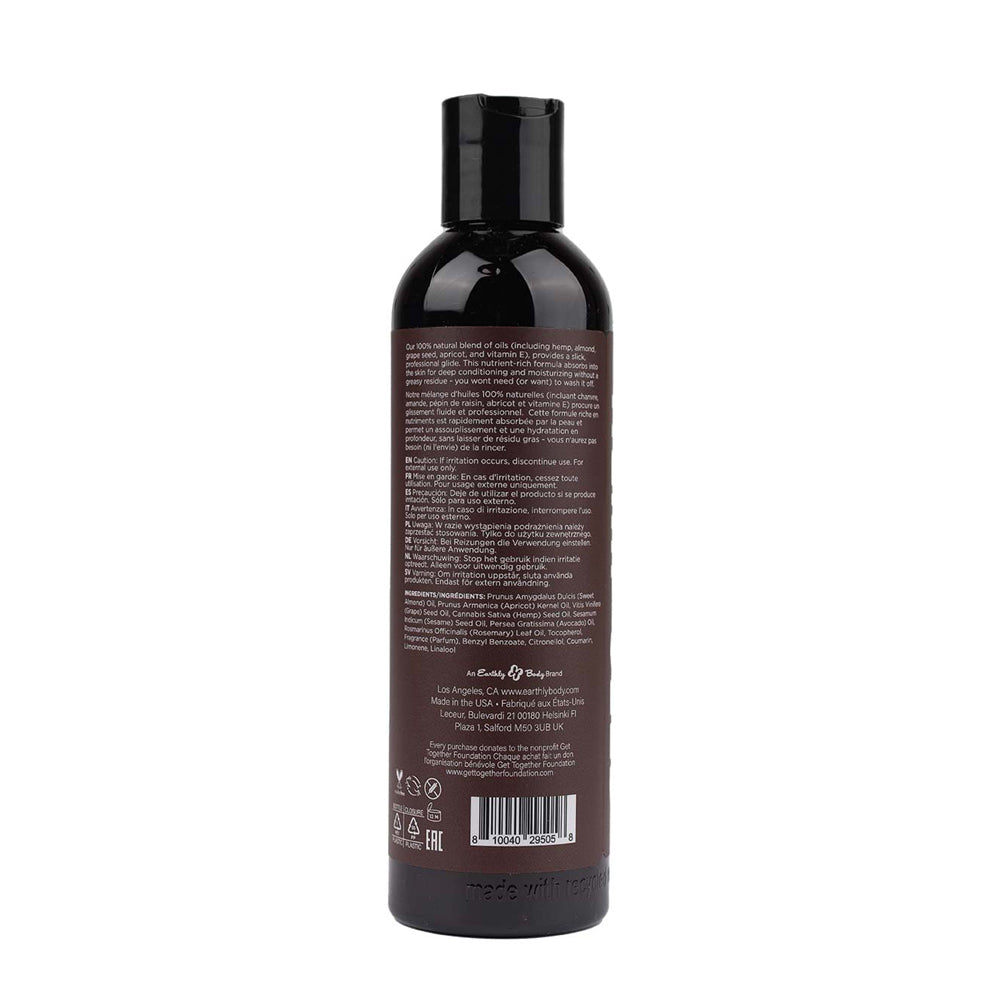 A bottle of Earthly Body Hemp Seed Massage and Body Oil in Kashmir Musk scent.