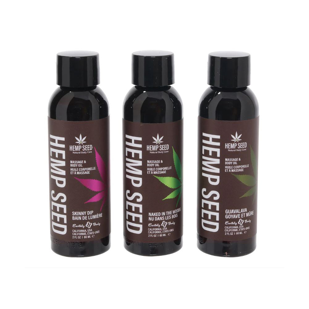 Three bottles of Hemp Seed massage and body oil with different leaf designs.