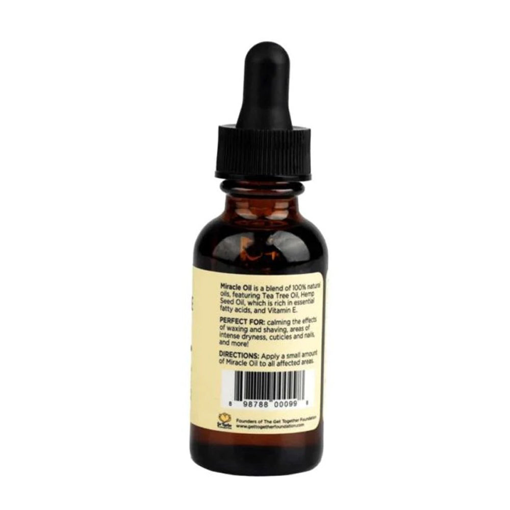 A brown glass dropper bottle of Miracle Oil with a yellow label.