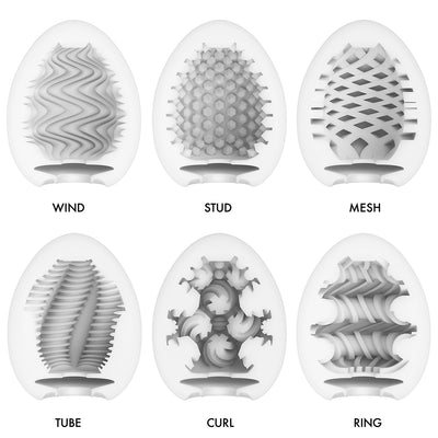 Six Tenga EGG masturbator sleeves with different textures: Wind, Stud, Mesh, Tube, Curl, and Ring.