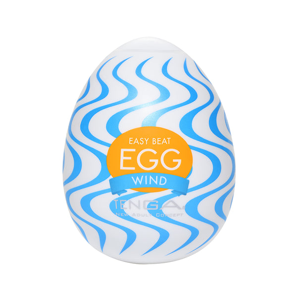 Tenga Egg Wind textured male masturbator with blue wavy pattern.