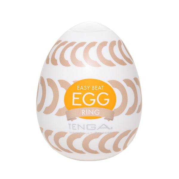 Tenga EGG Ring textured male masturbator sleeve with gold circular patterns.