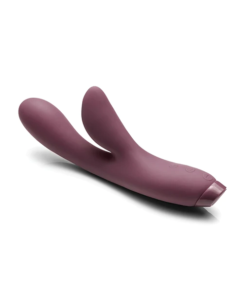 A purple rabbit vibrator with two curved stimulators and buttons on the base.