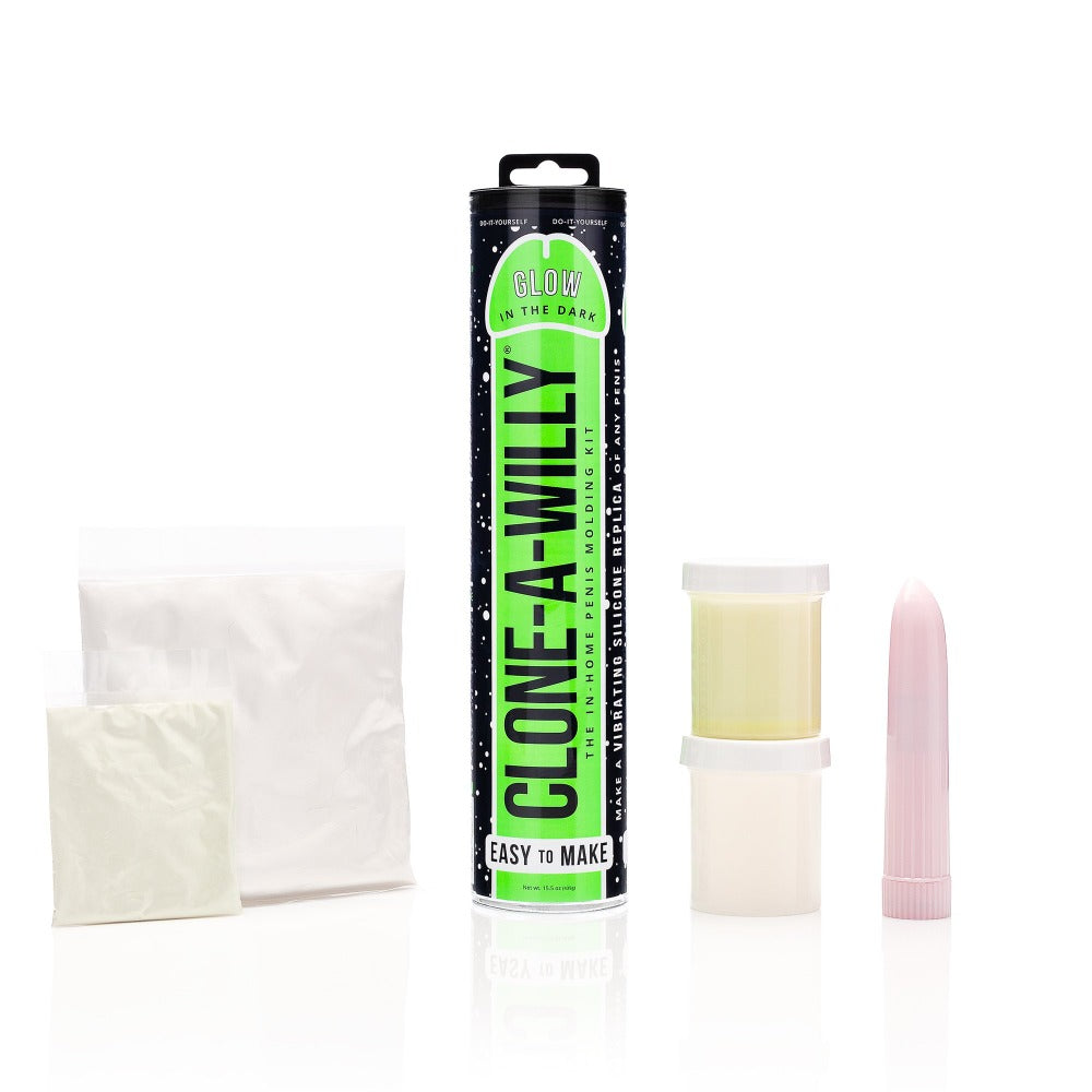 Glow in the dark silicone dildo casting kit with molding supplies and a vibrator.