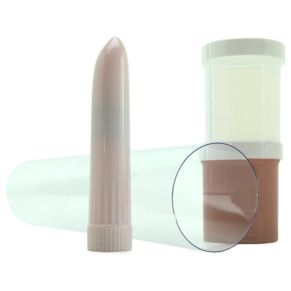 A pink penis mold and two containers of casting material are inside a clear tube.