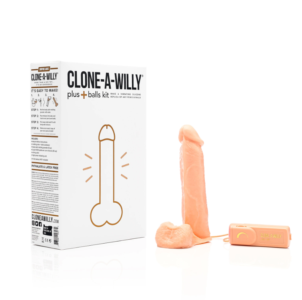 DIY silicone penis and balls casting kit in light tone with vibrator.