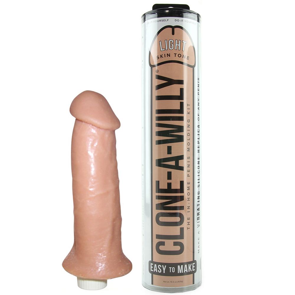 Clone-A-Willy DIY silicone molding kit in light skin tone with sample dildo and packaging tube.