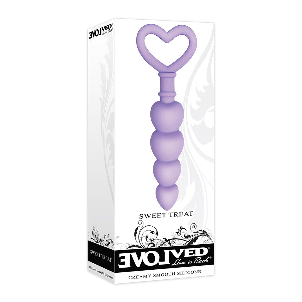 Purple heart-shaped graduated anal beads on a white box.
