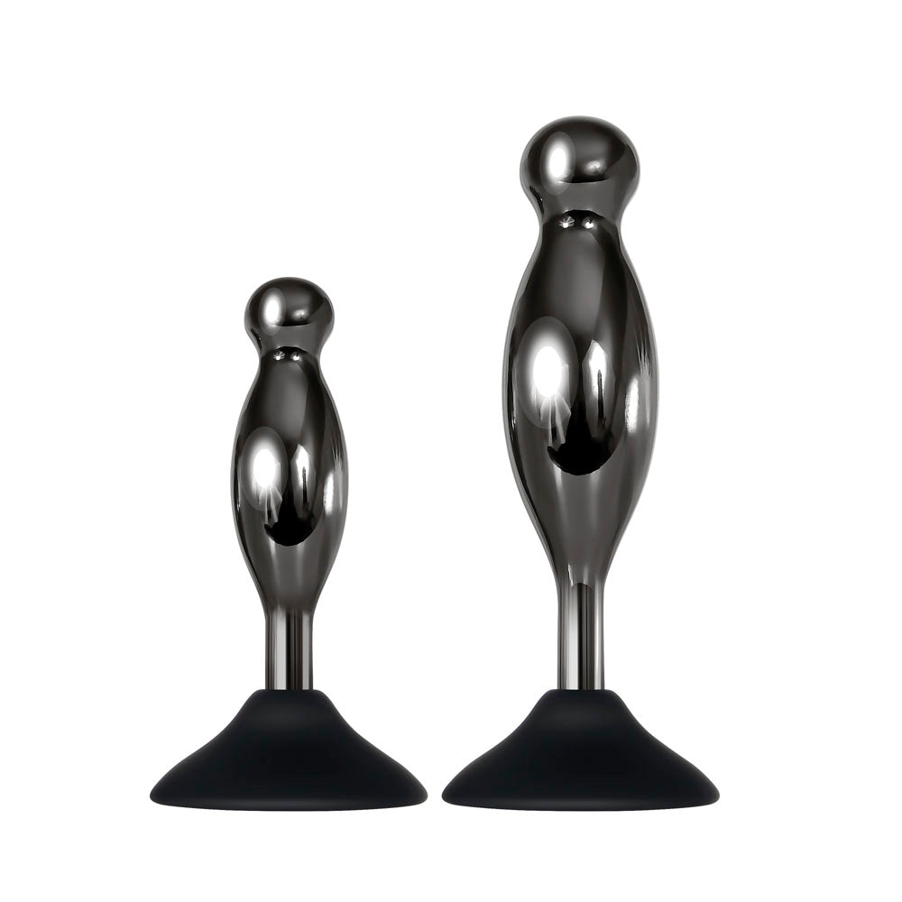 Two black suction cup anal plugs of different sizes.