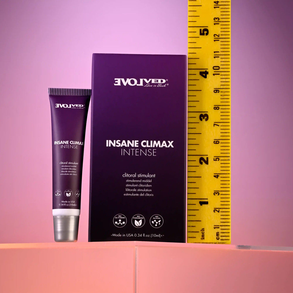 Insane Climax Intense Clitoral Stimulating Oil tube and box next to a ruler.