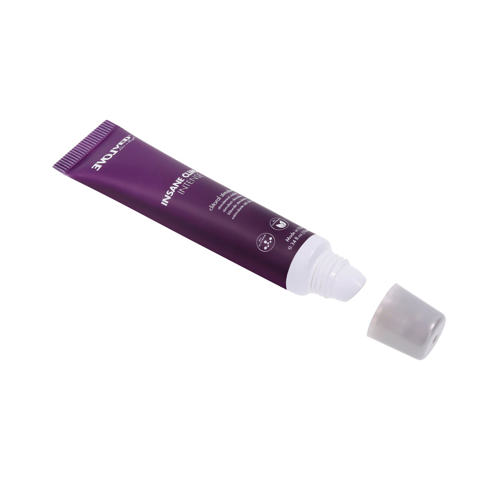 Purple tube of Insane Climax Intense Clitoral Stimulating Oil with cap off.
