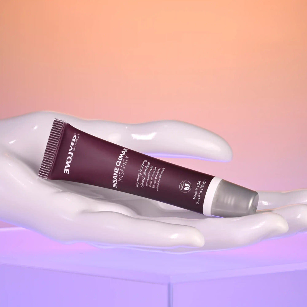 A tube of Insanity Warming and Buzzing Climax Gel with text.