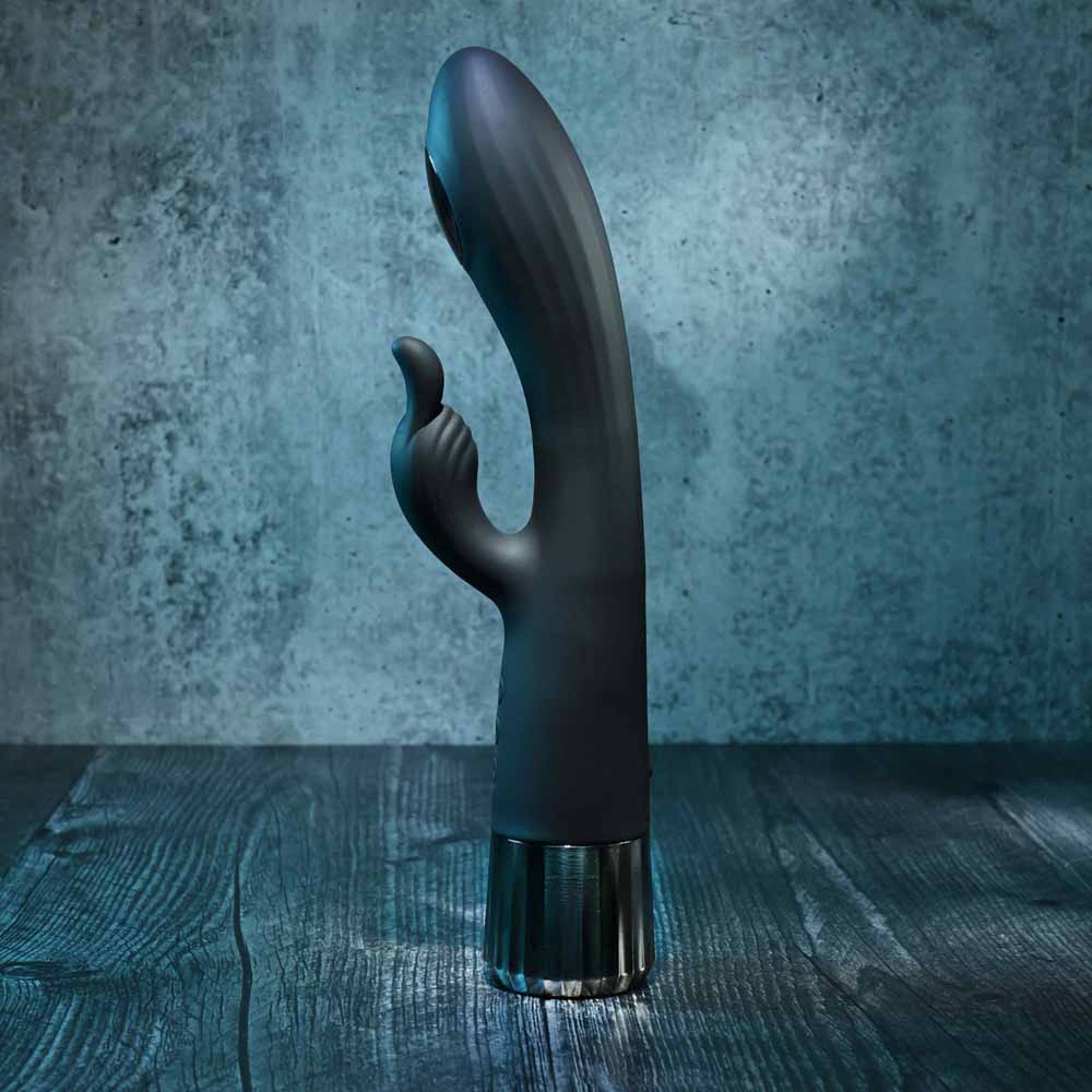 Black G-spot rabbit vibrator with a chrome base and textured surface.