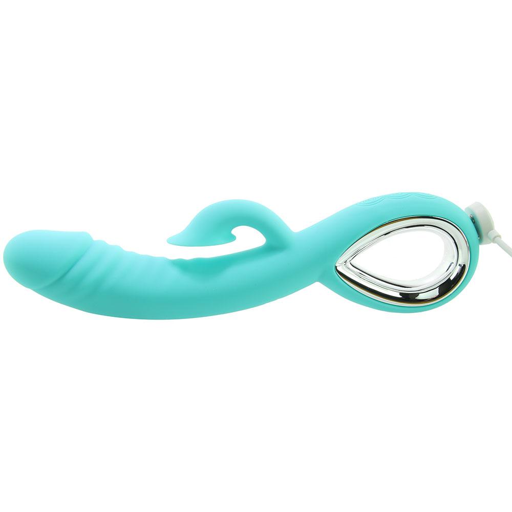A teal rabbit vibrator with a curved shaft and a silver-rimmed loop.