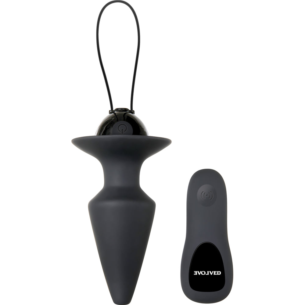 A black silicone vibrating butt plug with a remote control.