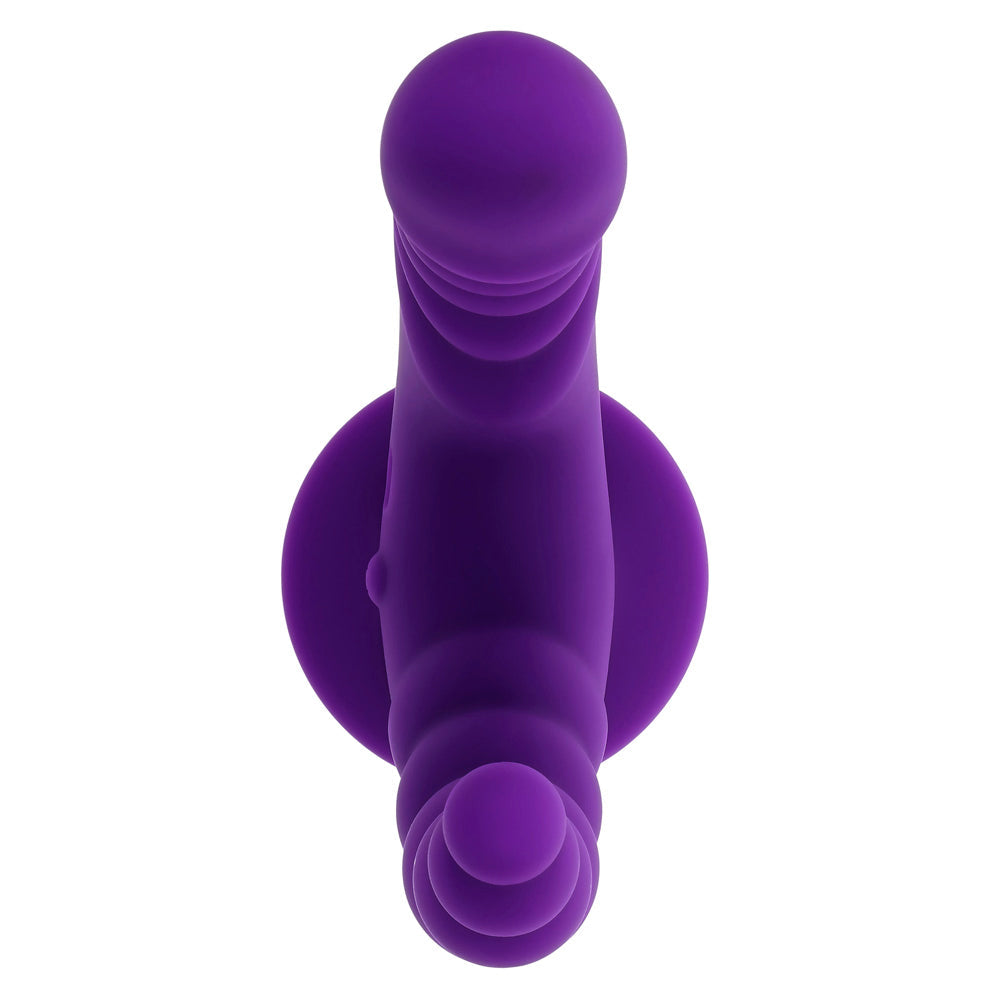 Purple dual stimulating vibrator with suction cup and textured shaft.