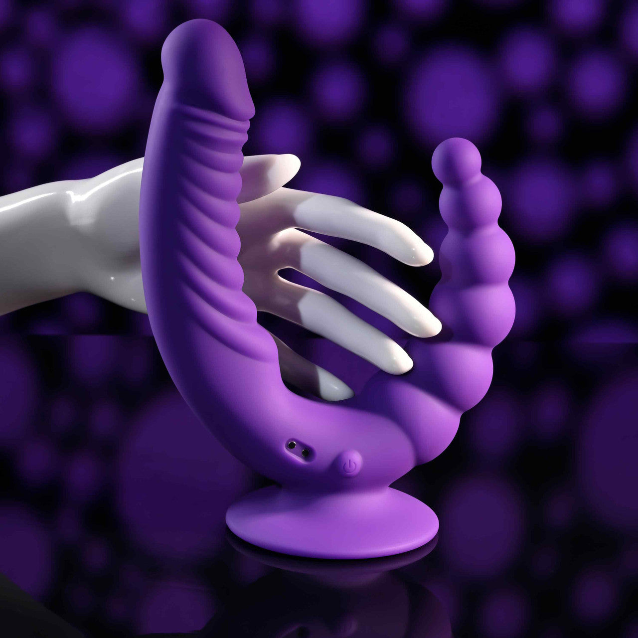 Purple dual stimulating vibrator with a suction cup and textured shaft.