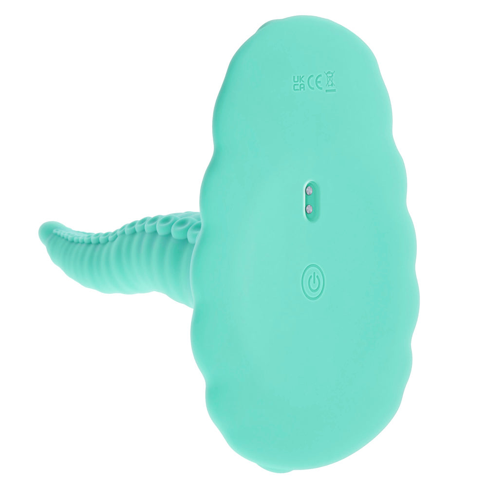 A teal vibrating tentacle grinder with a suction base and power button.