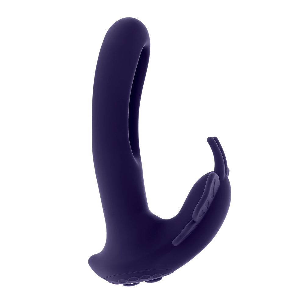 A purple butterfly-shaped stimulator with a curved shaft and two small wings.