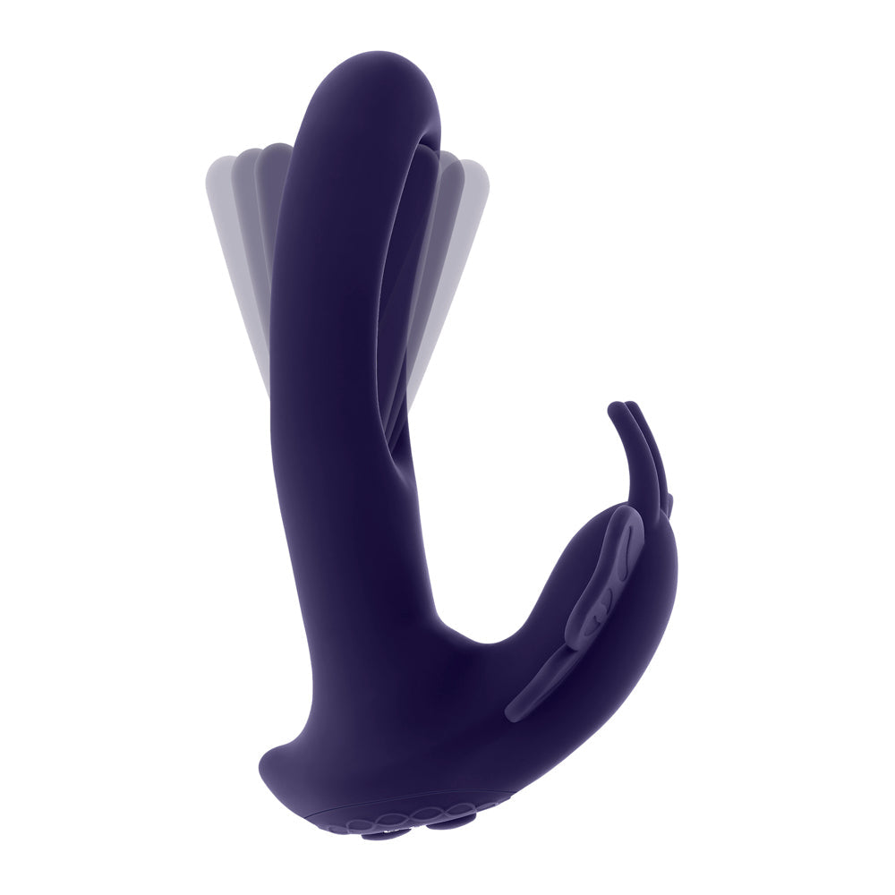 A purple butterfly-shaped stimulator with flapping wings and a remote control.