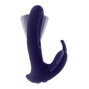A purple butterfly-shaped stimulator with flapping wings and a remote control.