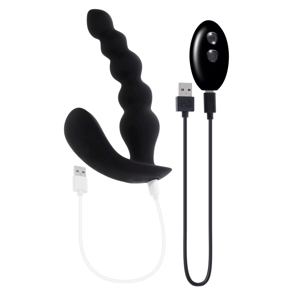 Black silicone vibrator with beaded shaft, remote, and USB charging cables.