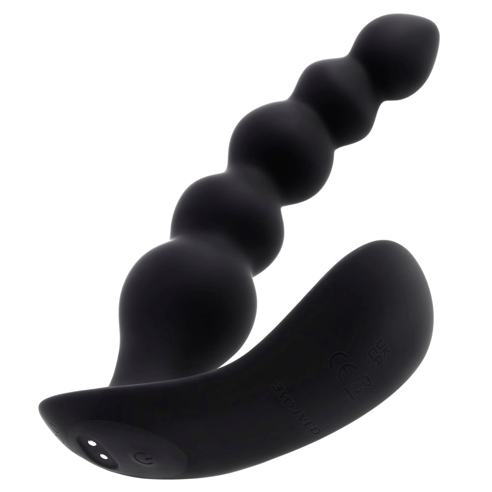 Black beaded vibrator with a curved base and charging ports.