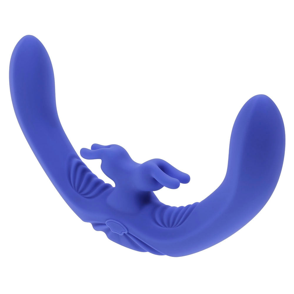 A purple dual rabbit vibrator with textured ridges and a central stimulator.