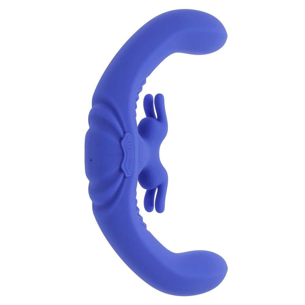A purple dual rabbit vibrator with a curved body and a remote control.