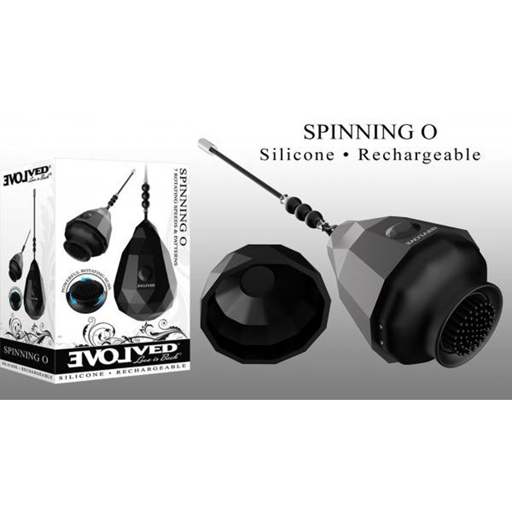 Black rechargeable spinning clitoral stimulator egg with silicone brush.