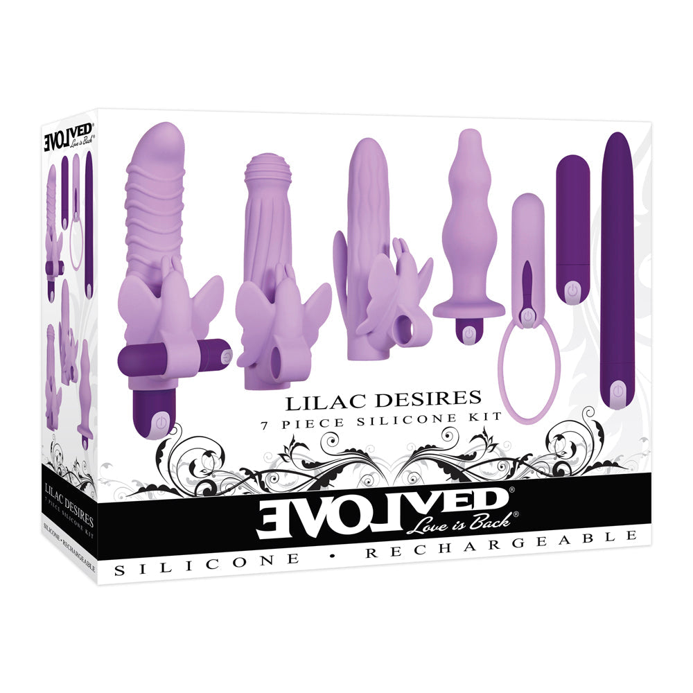 A 7-piece lilac silicone vibrator kit with various shapes and a ring accessory.