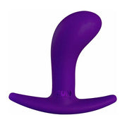 Purple curved anal plug with a wide base and "FUN FACTORY" logo.
