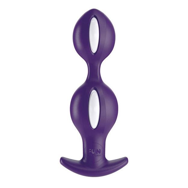 Purple weighted anal plug with inner balls and a flared base.