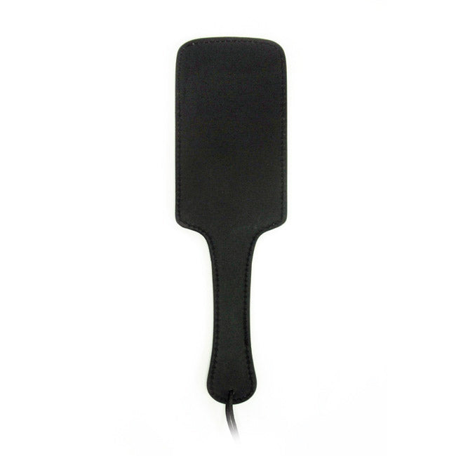 Black leather impact paddle with a wide surface area and handle.