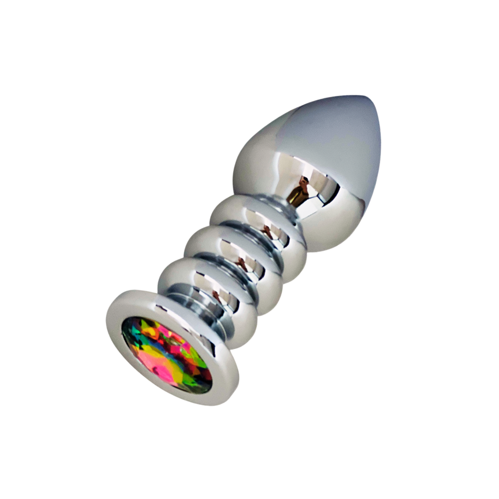 Silver anal plug with a flared base featuring a colorful gem.
