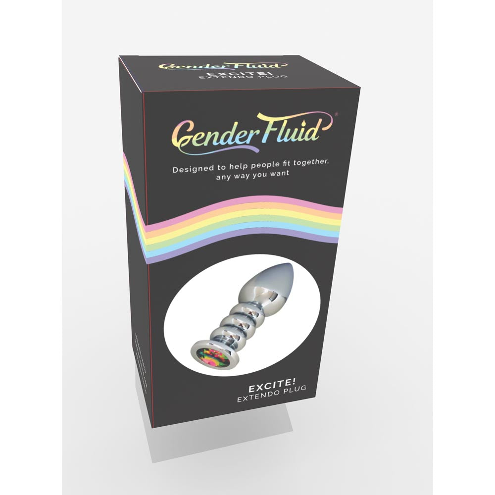 A silver anal plug with a rainbow-colored base on a black box.